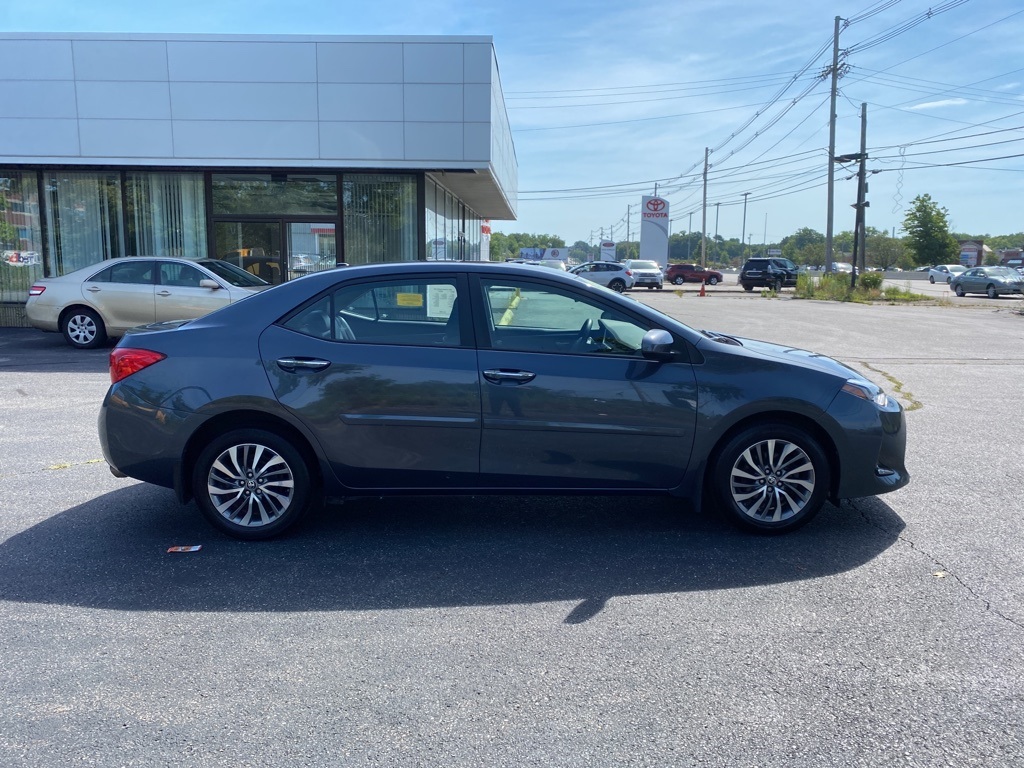 PreOwned 2017 Toyota Corolla XLE 4D Sedan FWD